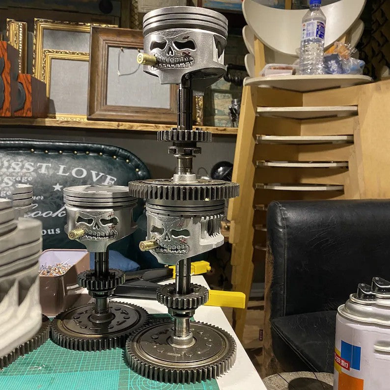 Custom Piston Skull Sculpture on Gear Base.